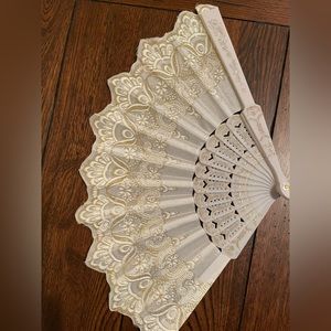 White and gold folding fans